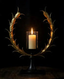 CANDELABRO DECORATIVO EN METAL DORADO Y NEGRO