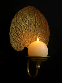 CANDELABRO DE PARED EN METAL DORADO