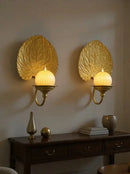CANDELABRO DE PARED EN METAL DORADO