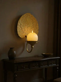 CANDELABRO DE PARED EN METAL DORADO